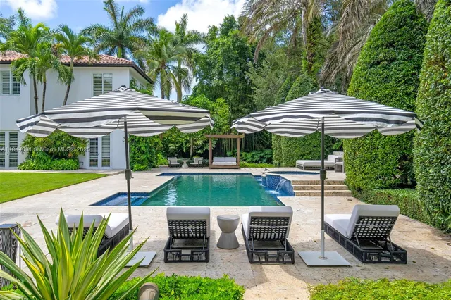 a view of a backyard with a tub