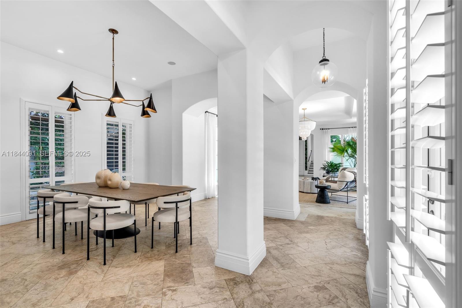 7320 Southwest 79th Court Miami, FL 33143 - Photo 33 of 89 a view of a dining room and livingroom