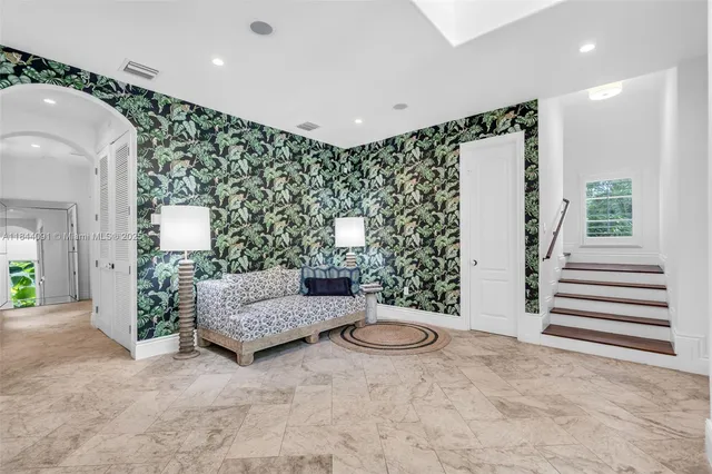 a bathroom with a sink and mirror