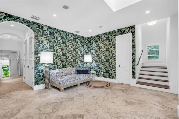 a front view of a house with a porch