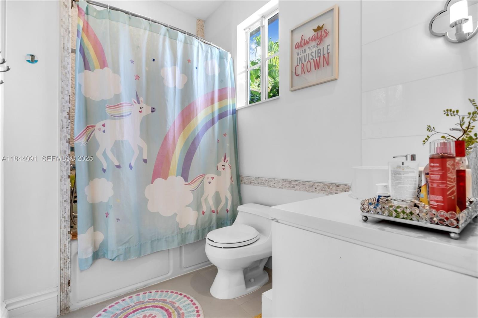 7320 Southwest 79th Court Miami, FL 33143 - Photo 58 of 89 a bathroom with a toilet and a shower