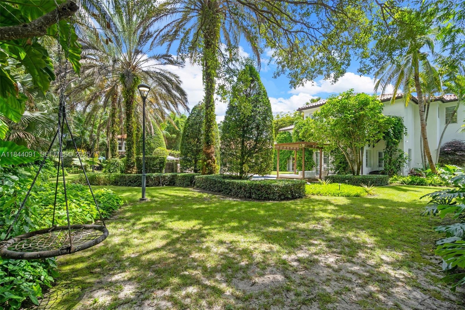 7320 Southwest 79th Court Miami, FL 33143 - Photo 81 of 89 a view of a park with a tree