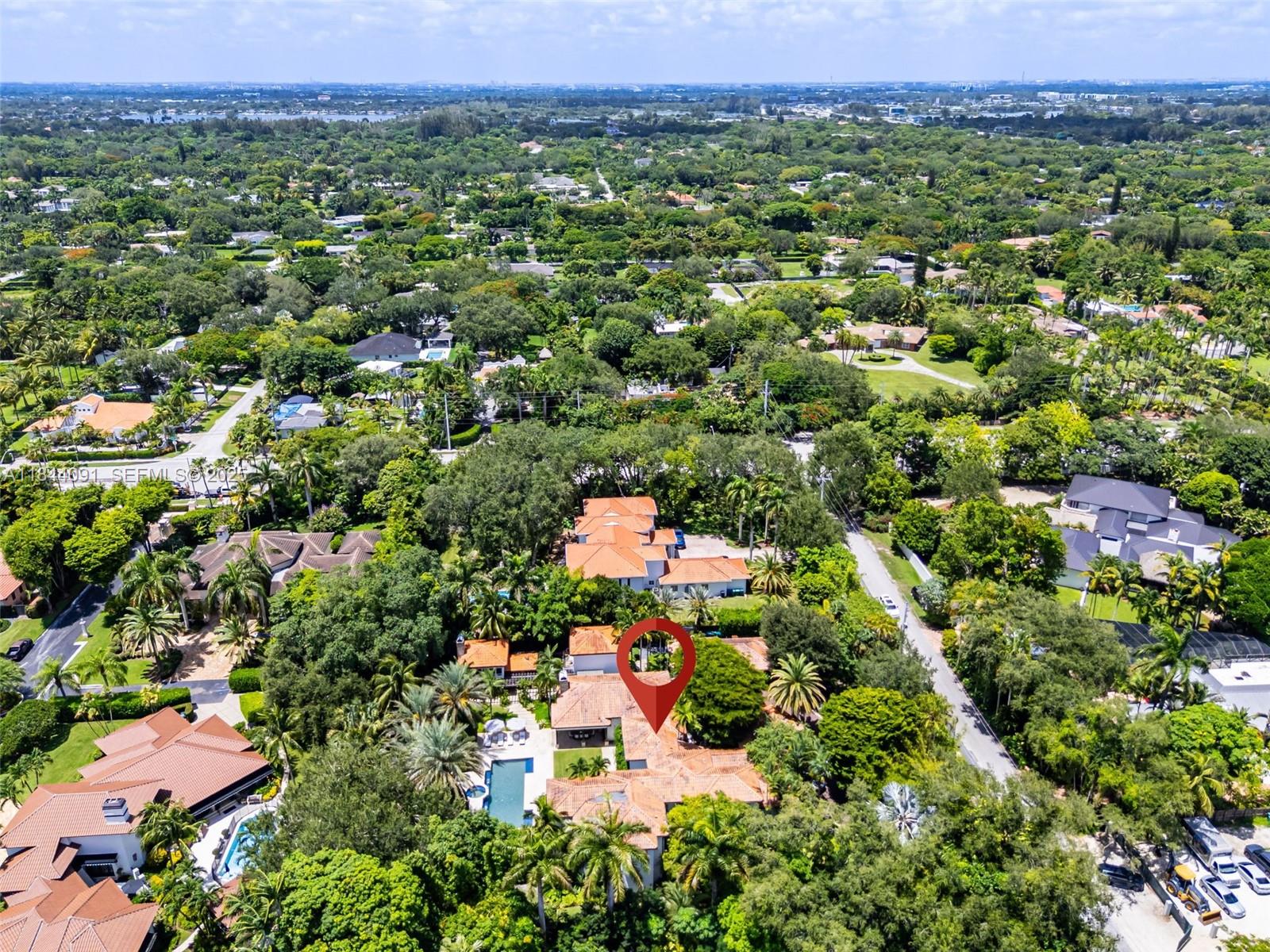 7320 Southwest 79th Court Miami, FL 33143 - Photo 89 of 89 an aerial view of residential house with outdoor space and trees all around