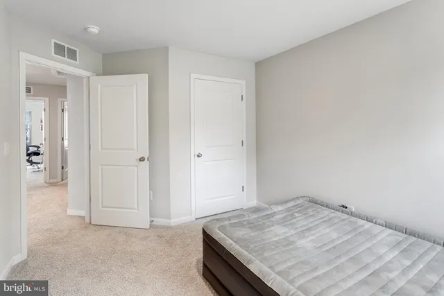 an empty room with a wooden floor