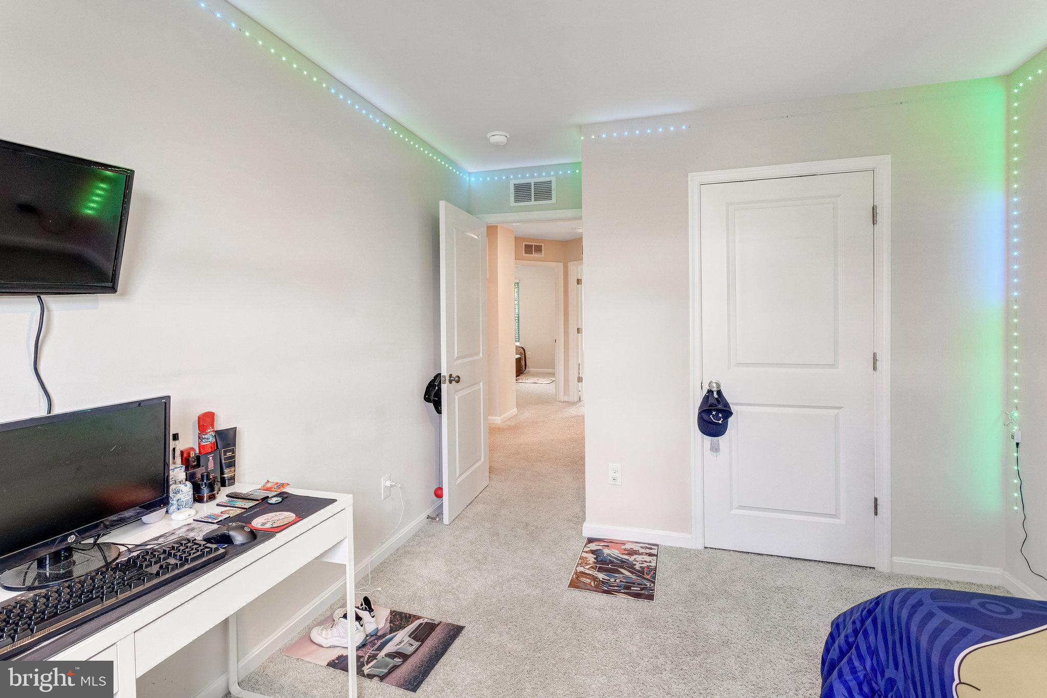 35460 Quail Meadow Lane Locust Grove, VA 22508 - Photo 31 of 39 a bedroom with a bed and a flat screen tv