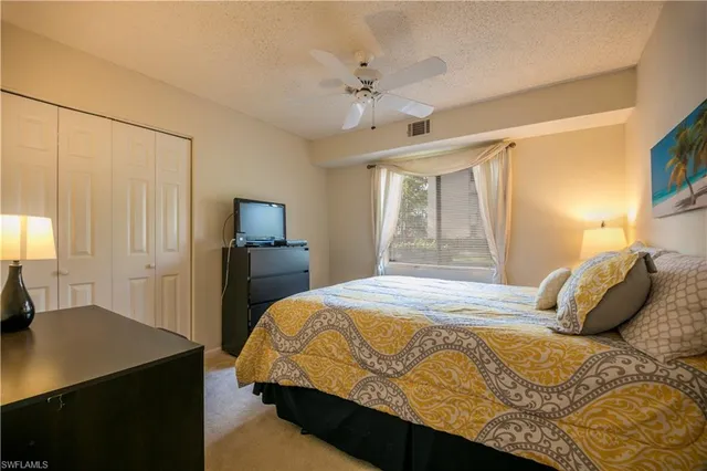 a living room filled with furniture and a garden