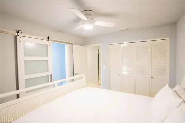 a bathroom with a shower and a tub