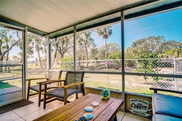 a living room with large windows
