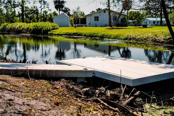 a view of a lake with a house
