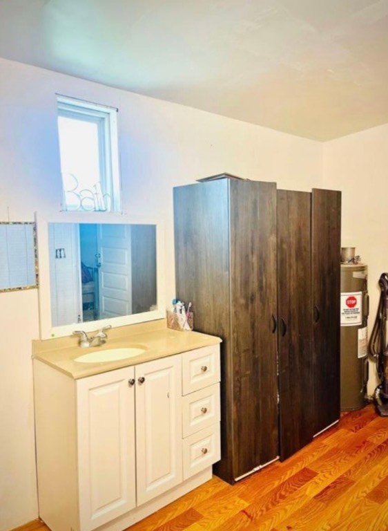 290 Pebblestone Road Dale, TX 78616 - Photo 8 of 10 a bathroom with a sink vanity and a mirror