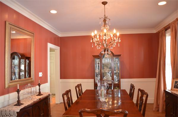 7 Westledge Road Marblehead, MA 01945 - Photo 8 of 26 a view of a dining room with furniture and chandelier