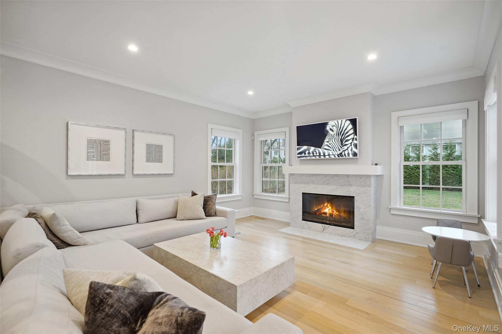 25 Hunt Place Rye, NY 10580 - Photo 11 of 44 a living room with furniture and a fireplace