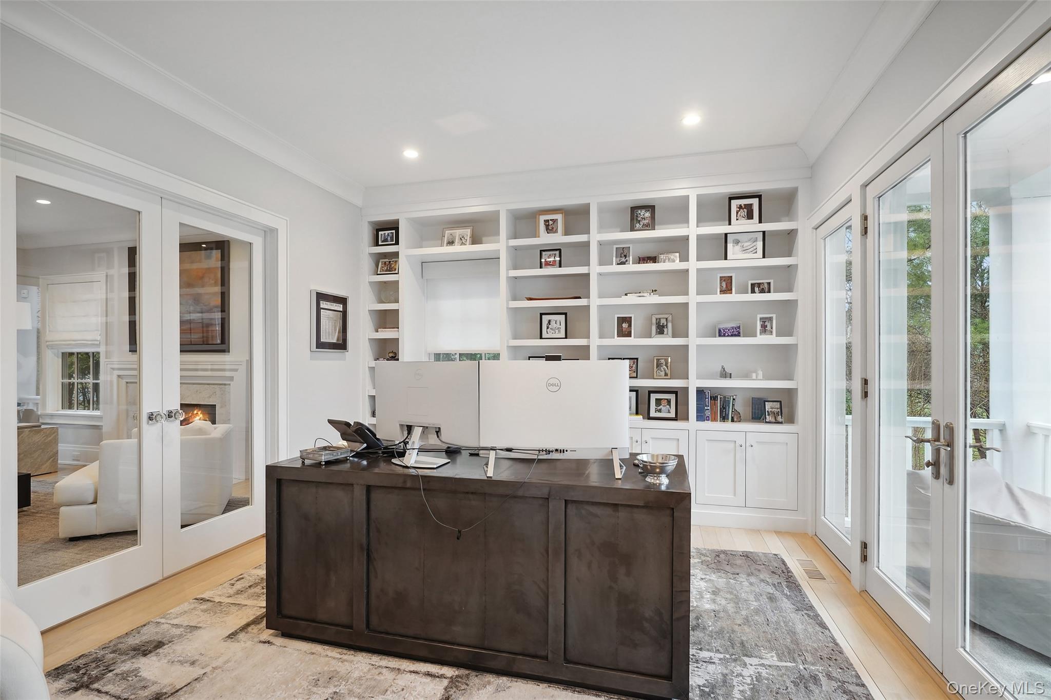 25 Hunt Place Rye, NY 10580 - Photo 12 of 44 a living room with a large window and gym equipment