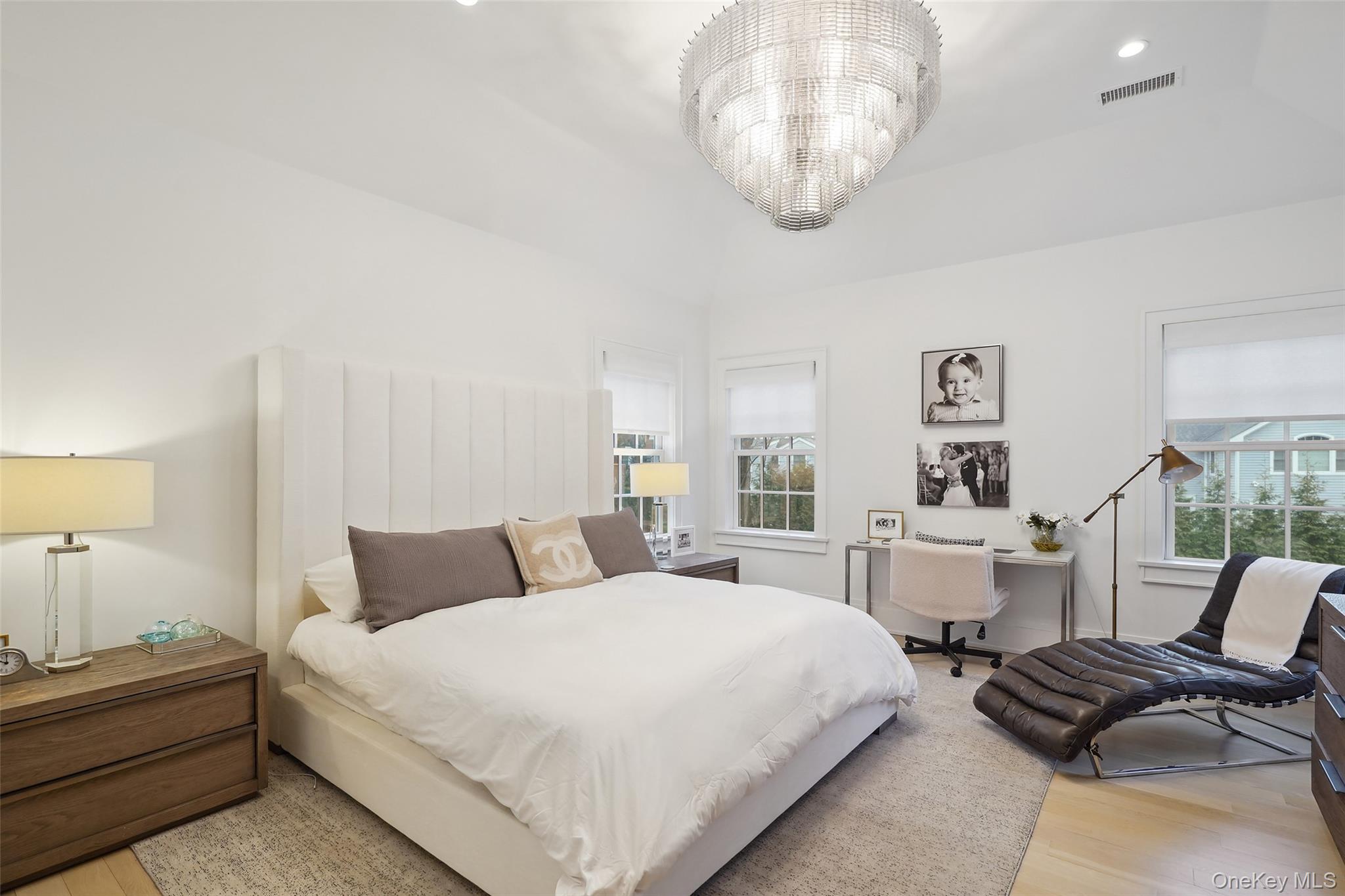 25 Hunt Place Rye, NY 10580 - Photo 15 of 44 a bedroom with bed and a chair