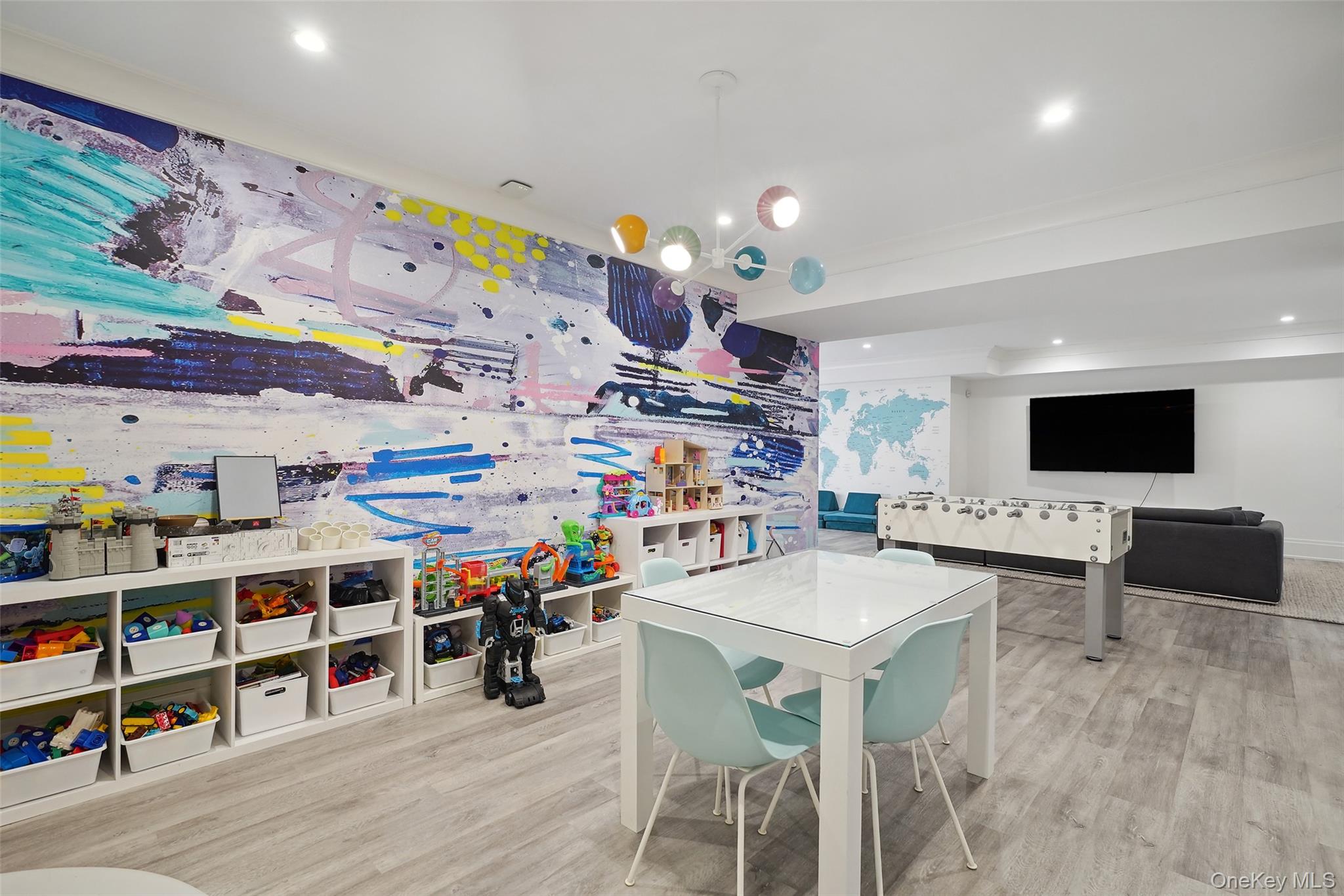 25 Hunt Place Rye, NY 10580 - Photo 30 of 44 a view of a room with shelves and wooden floor