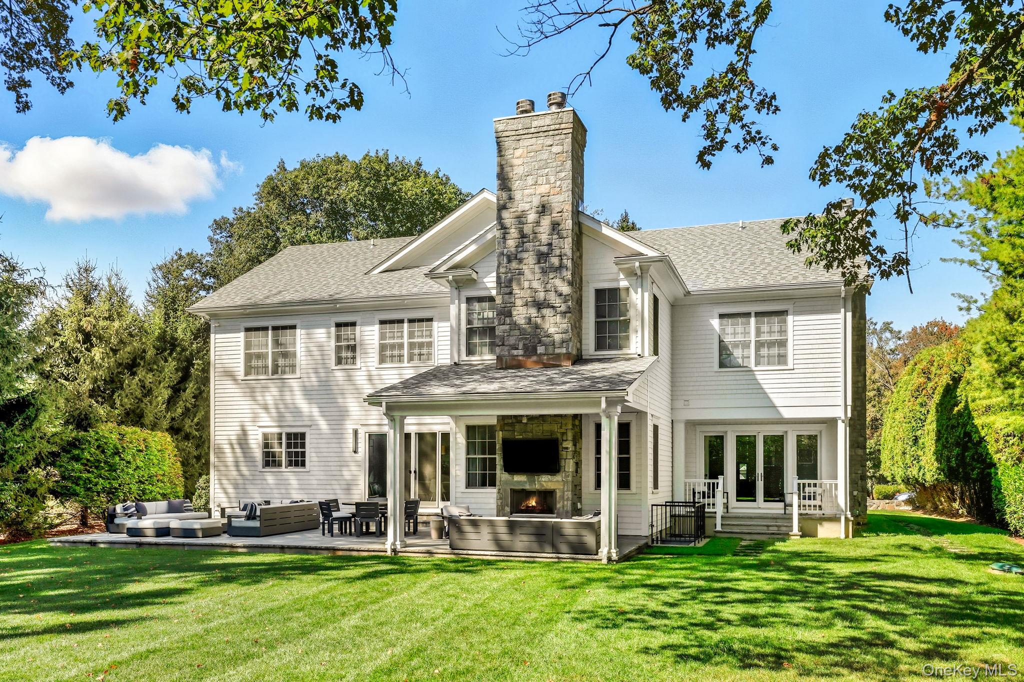 25 Hunt Place Rye, NY 10580 - Photo 35 of 44 front view of a house with a yard