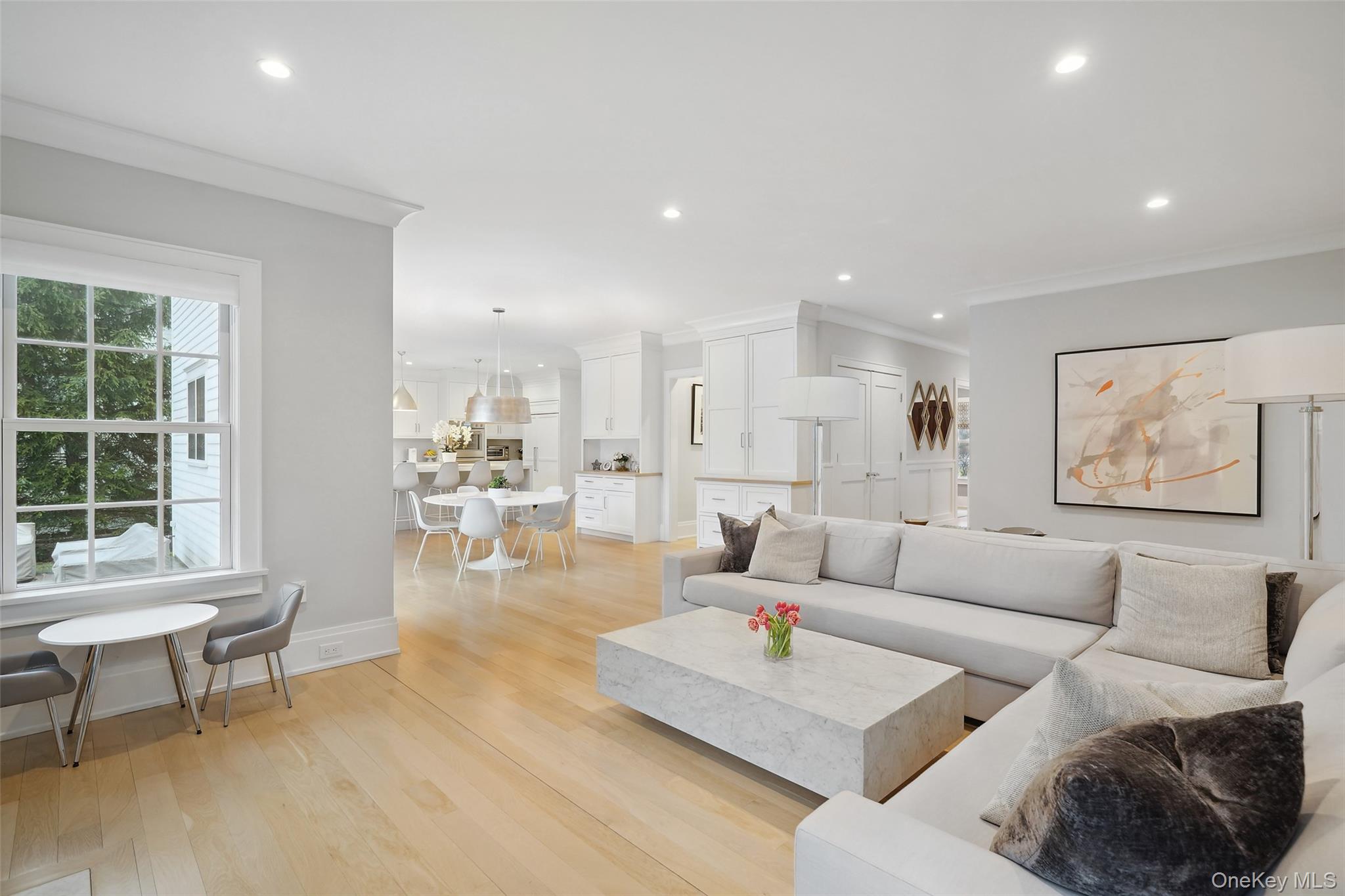 25 Hunt Place Rye, NY 10580 - Photo 10 of 44 a living room with furniture and a large window