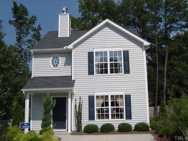 5617 Advantis Drive Raleigh, NC 27610 - Photo 1 of 1 a front view of a house with garden