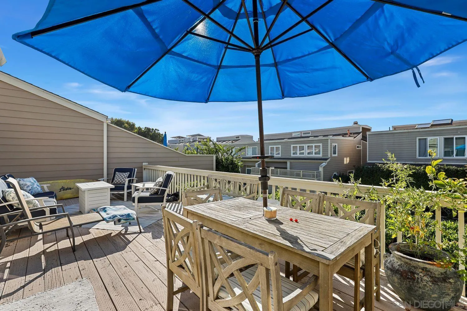 1818 Wilton Road Encinitas, CA 92024 - Photo 11 of 53 an outdoor space with furniture and umbrella