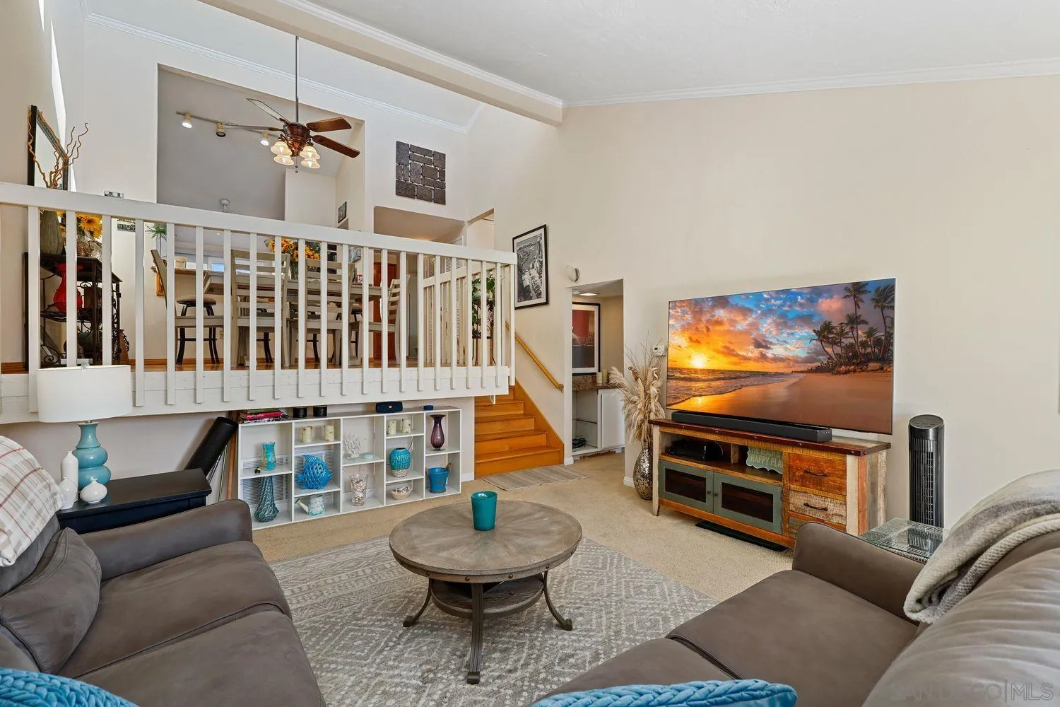 1818 Wilton Road Encinitas, CA 92024 - Photo 15 of 53 a living room with furniture and a flat screen tv