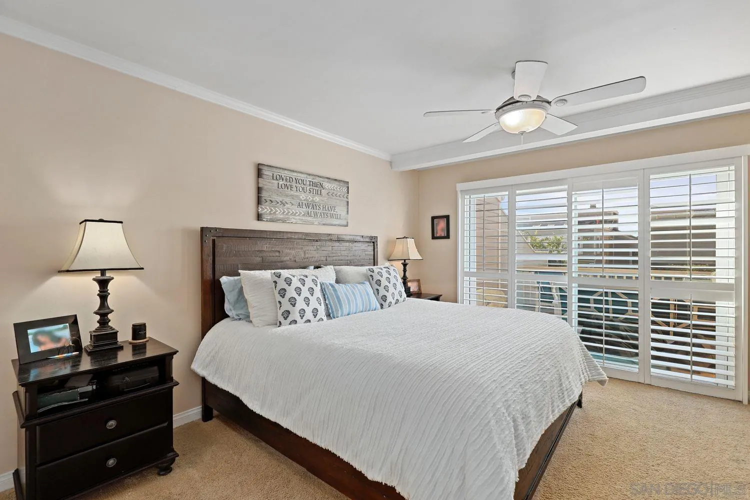 1818 Wilton Road Encinitas, CA 92024 - Photo 26 of 53 a bedroom with a bed and a window