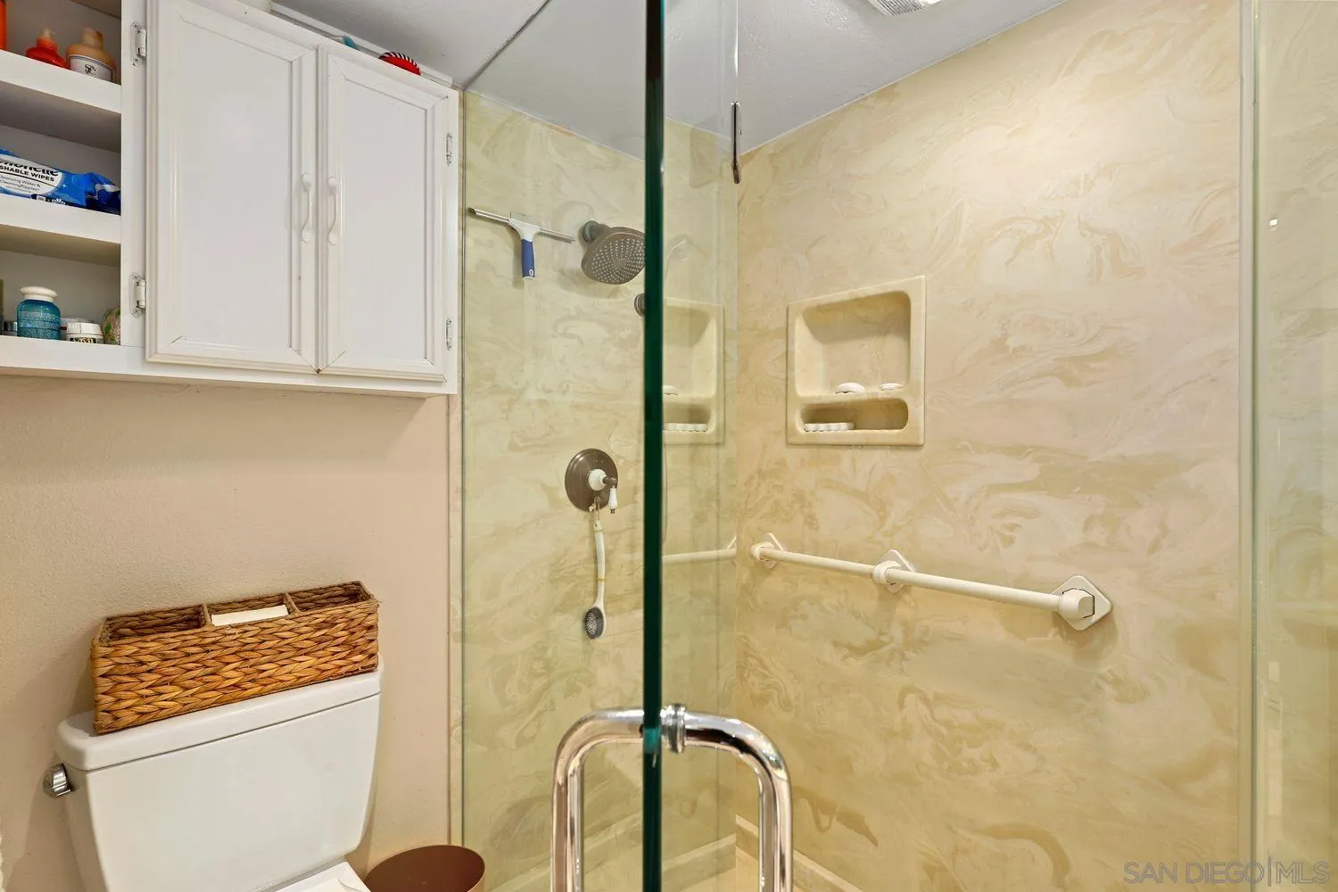 1818 Wilton Road Encinitas, CA 92024 - Photo 30 of 53 a bathroom with a shower and a sink