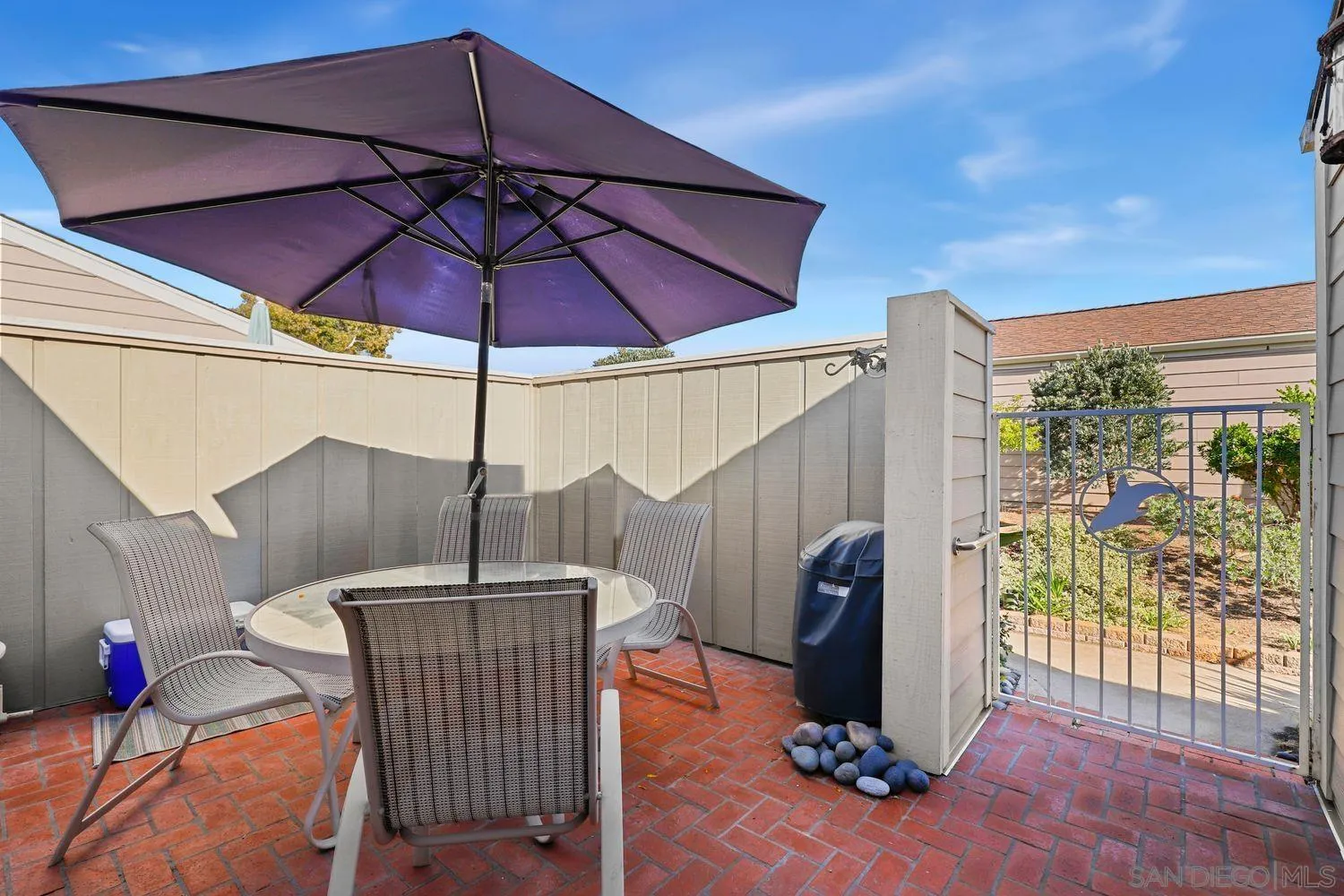 1818 Wilton Road Encinitas, CA 92024 - Photo 3 of 53 a table and chairs in the patio