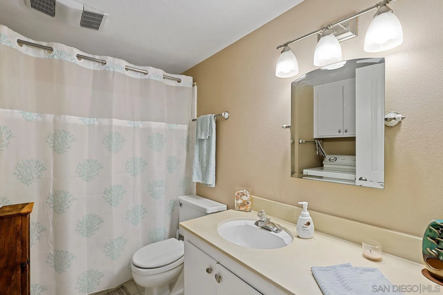 1818 Wilton Road Encinitas, CA 92024 - Photo 32 of 53 a bathroom with a sink vanity granite and toilet