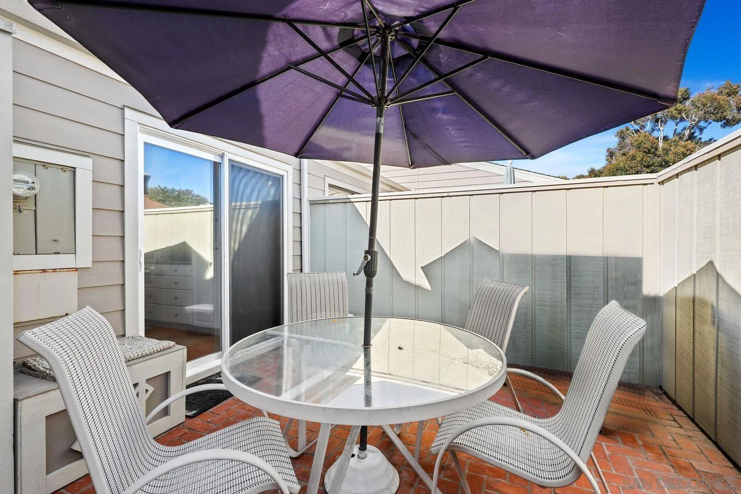 1818 Wilton Road Encinitas, CA 92024 - Photo 4 of 53 a table and chairs in a patio