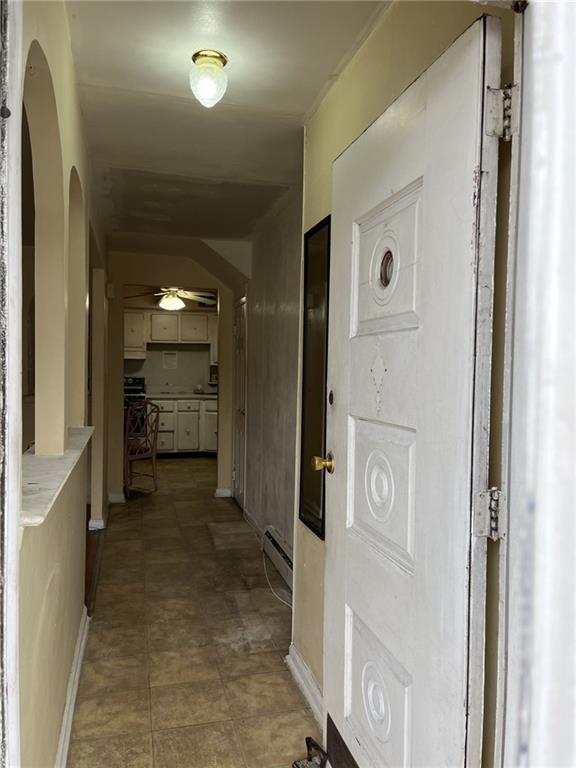 122 28th Avenue Brooklyn, NY 11214 - Photo 5 of 28 a bathroom with a sink and a mirror