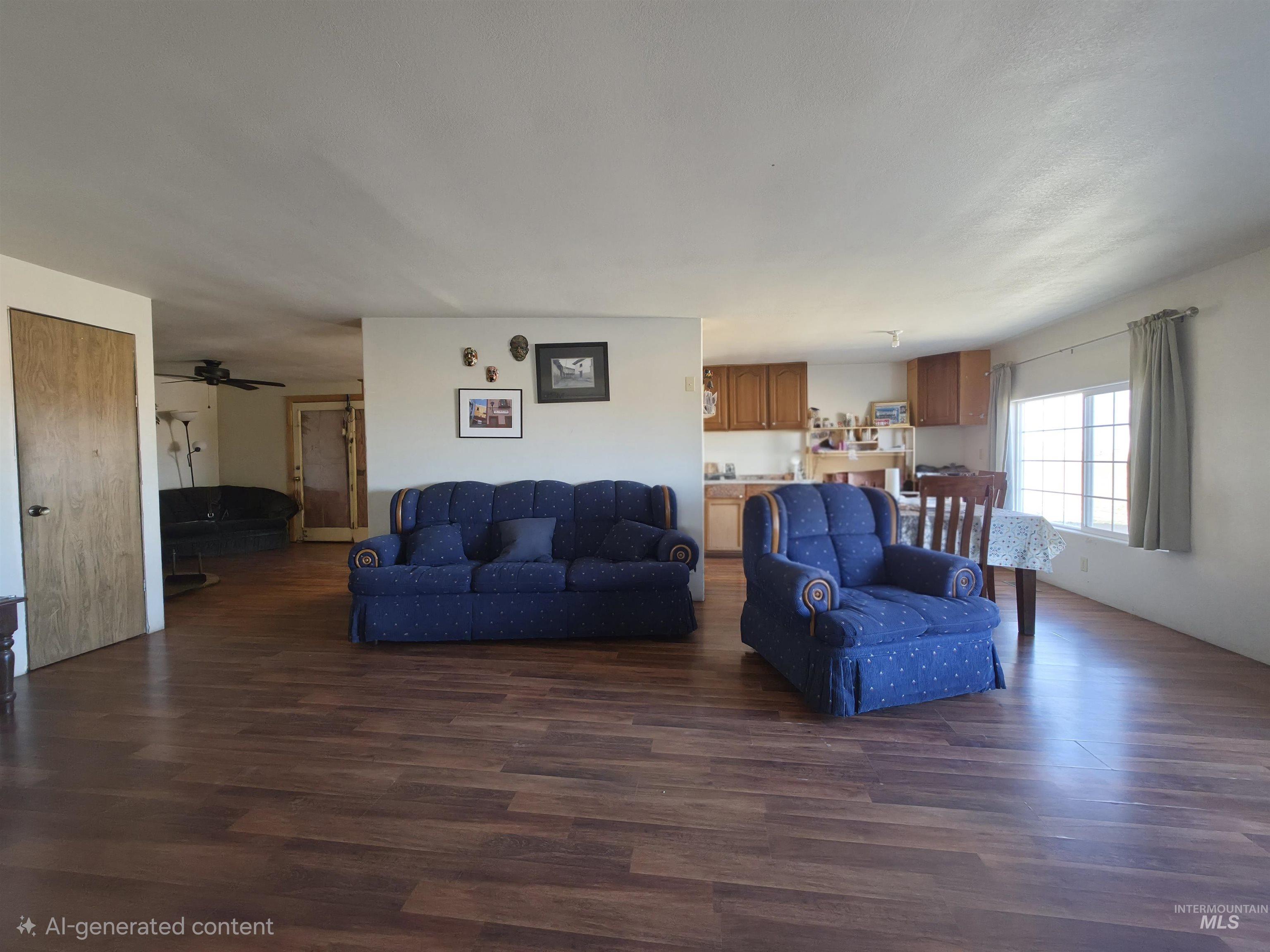 236 West 600 North Rupert, ID 83350 - Photo 14 of 29 Living room with dark wood-style flooring