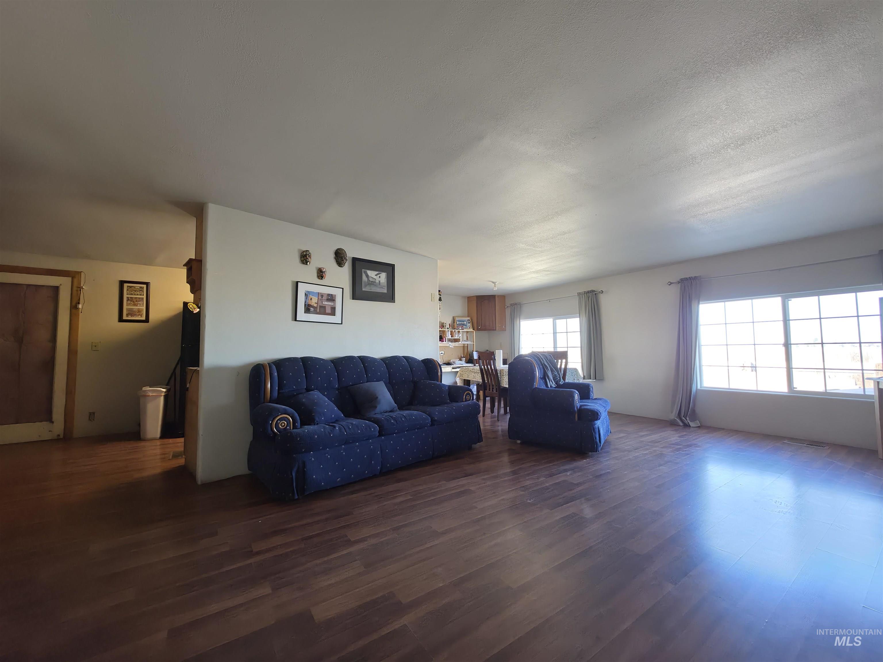 236 West 600 North Rupert, ID 83350 - Photo 15 of 29 Living area with wood finished floors