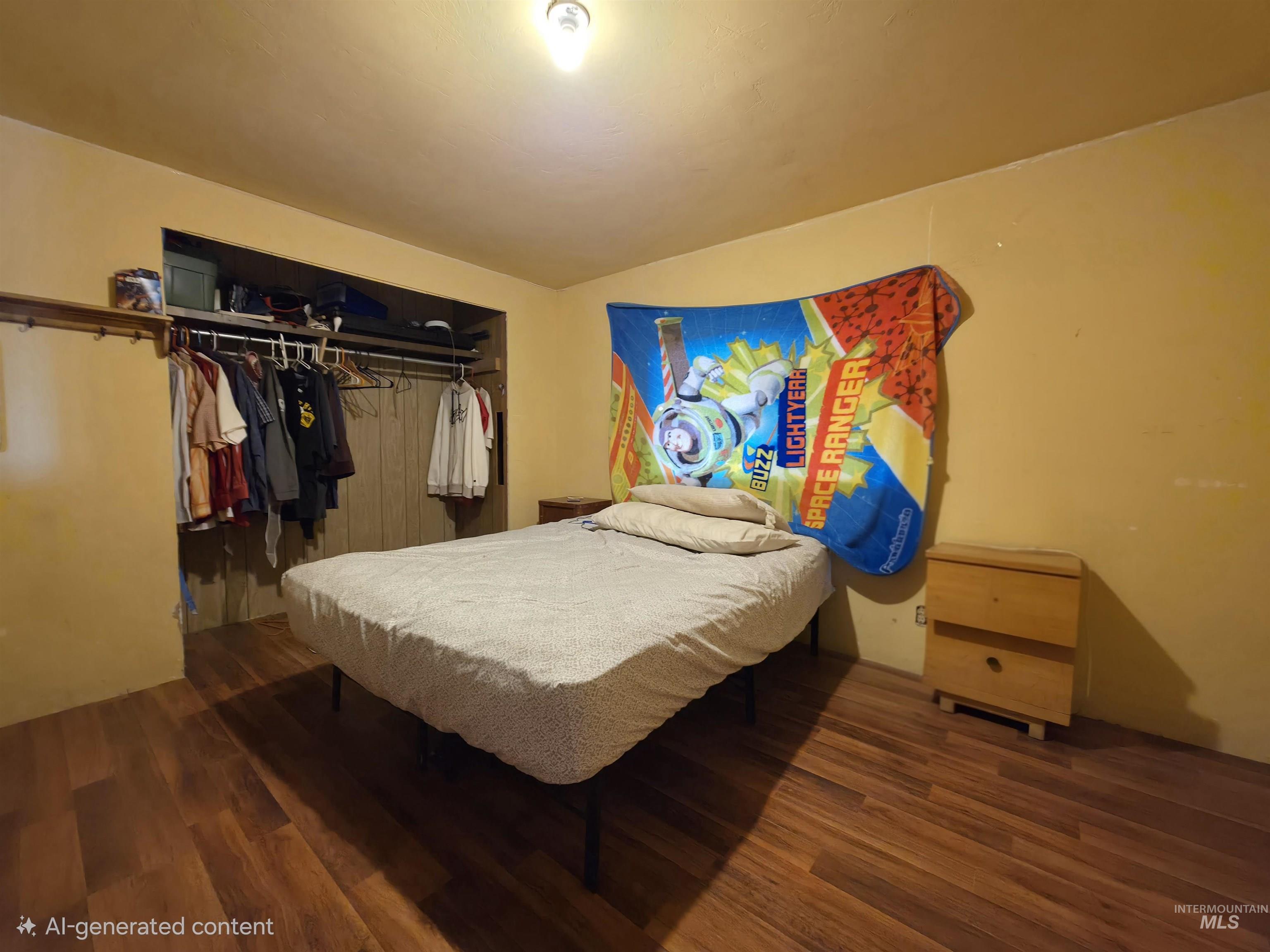 236 West 600 North Rupert, ID 83350 - Photo 20 of 29 Bedroom with dark wood finished floors and a closet