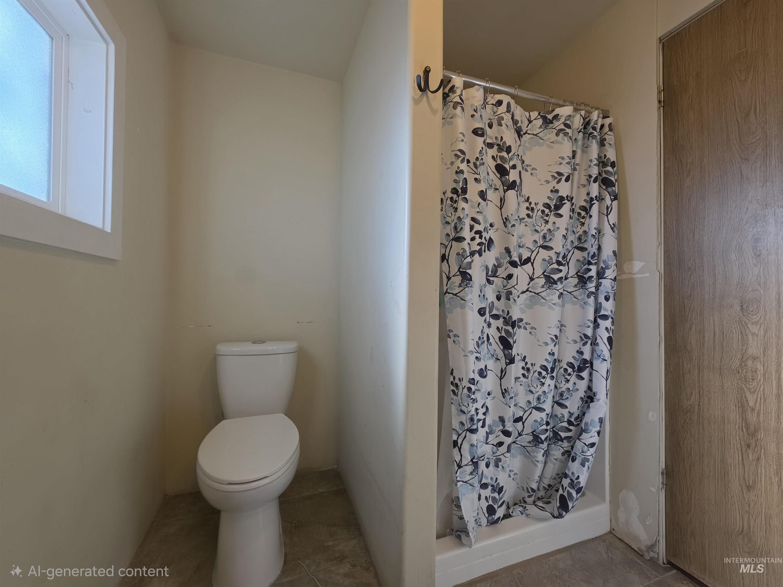 236 West 600 North Rupert, ID 83350 - Photo 22 of 29 Full bath with a stall shower and tile patterned floors