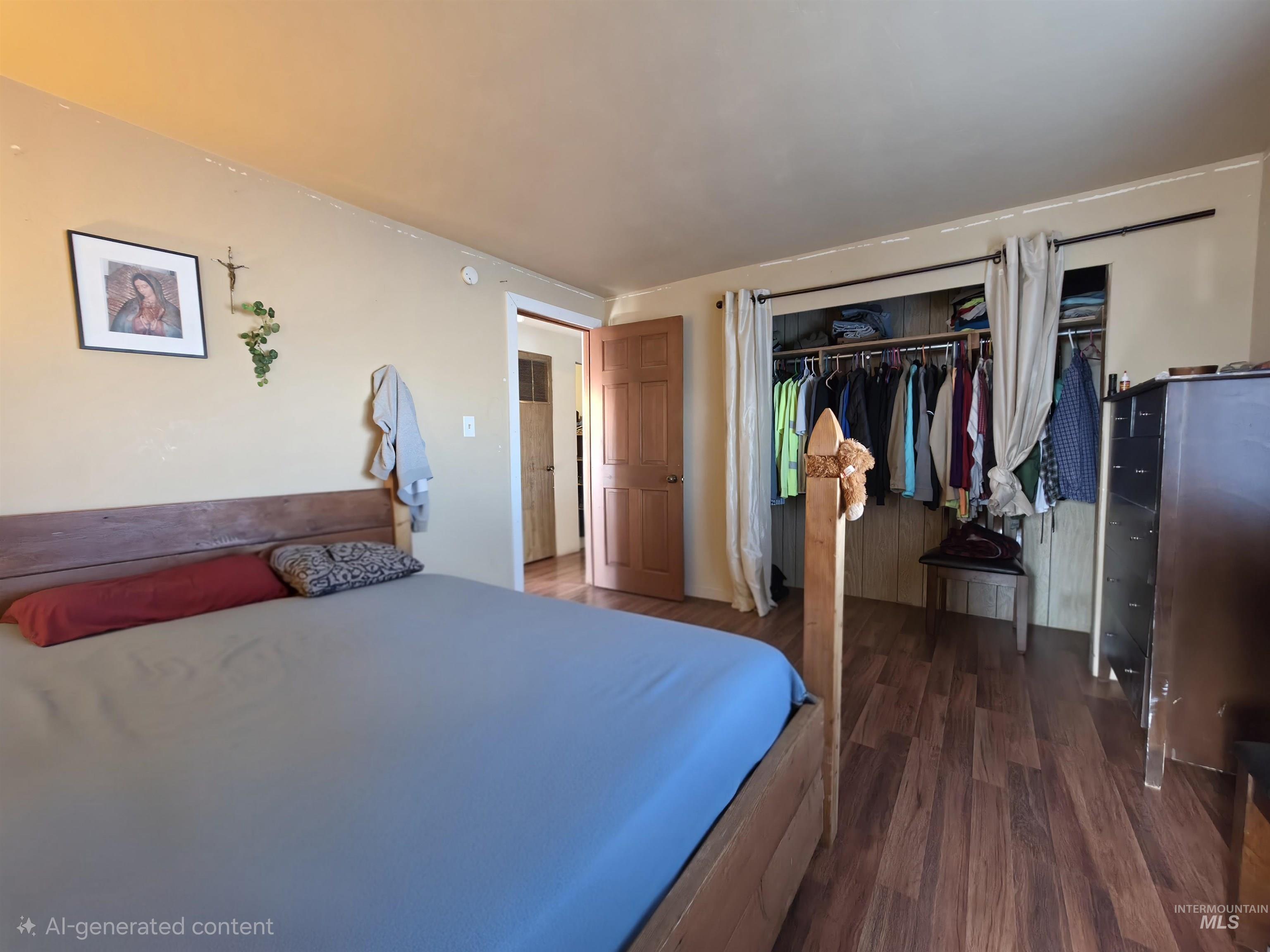 236 West 600 North Rupert, ID 83350 - Photo 24 of 29 Bedroom with a closet and wood finished floors