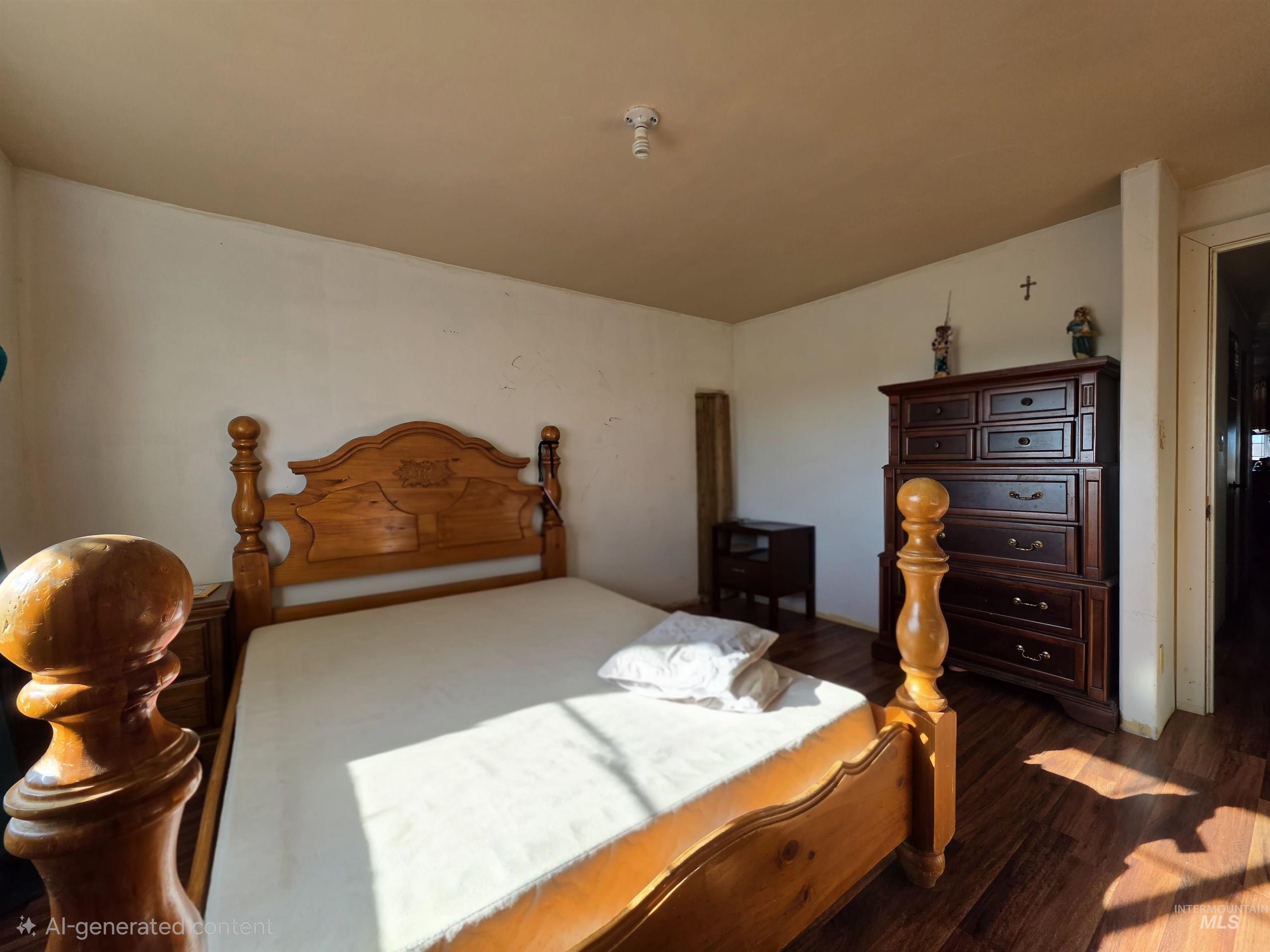 236 West 600 North Rupert, ID 83350 - Photo 28 of 29 Bedroom featuring dark wood-style floors