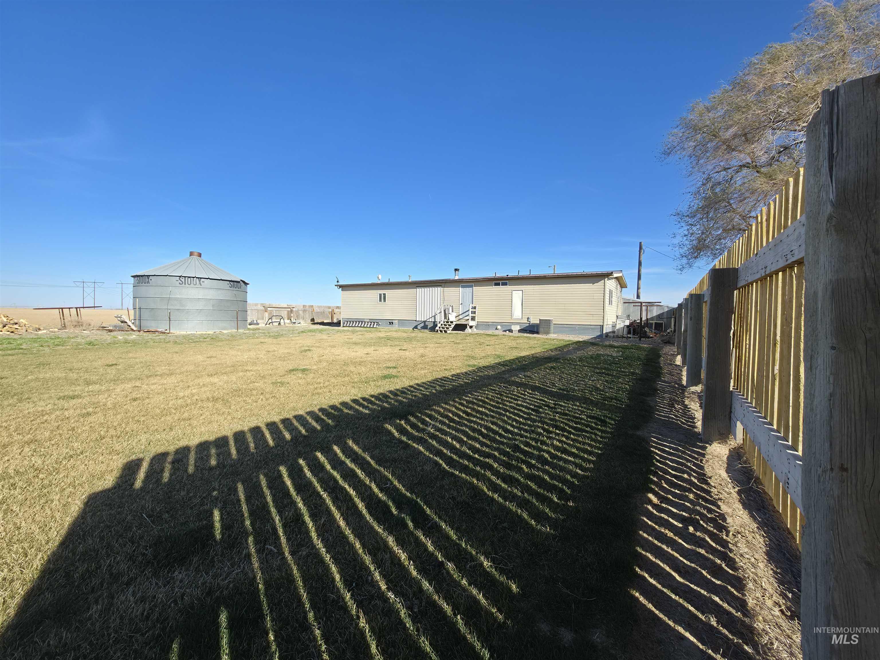 236 West 600 North Rupert, ID 83350 - Photo 4 of 29 View of fenced backyard