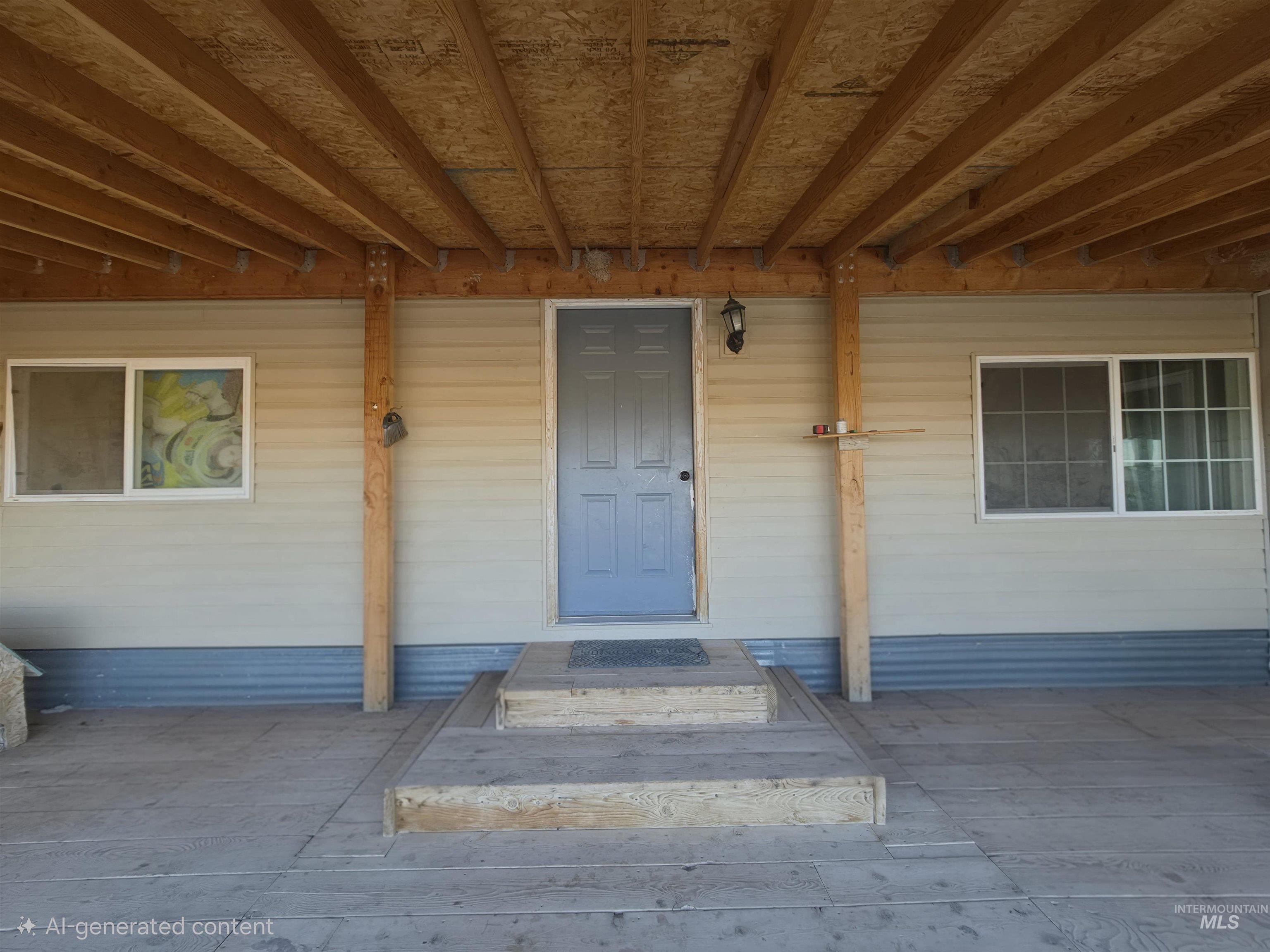 236 West 600 North Rupert, ID 83350 - Photo 9 of 29 Doorway to property featuring covered porch