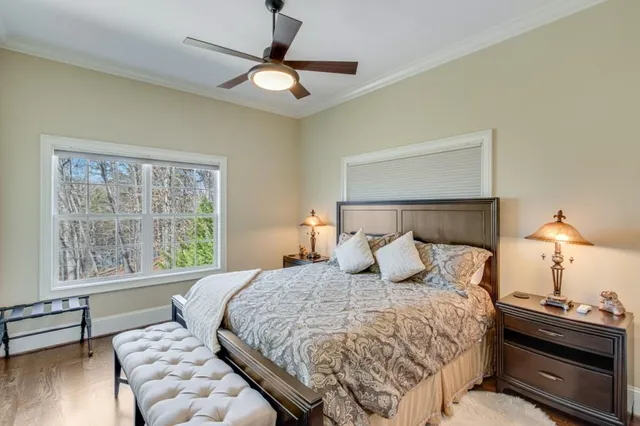 a bedroom with a bed and window