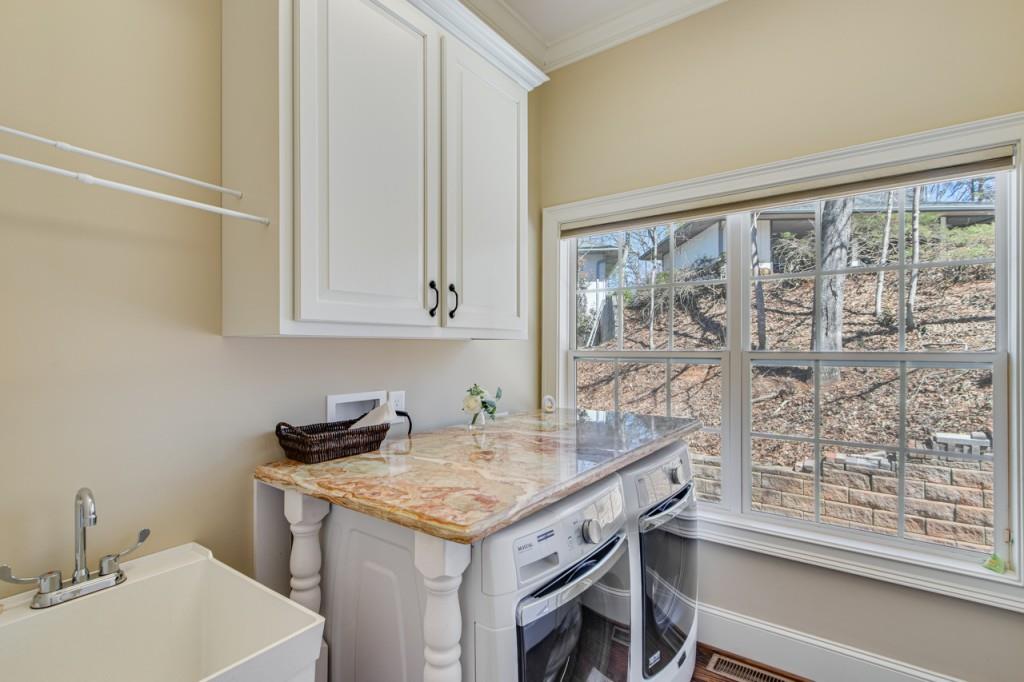 2152 Silver Circle Gainesville, GA 30501 - Photo 28 of 46 a view of a kitchen area with furniture and wooden floor