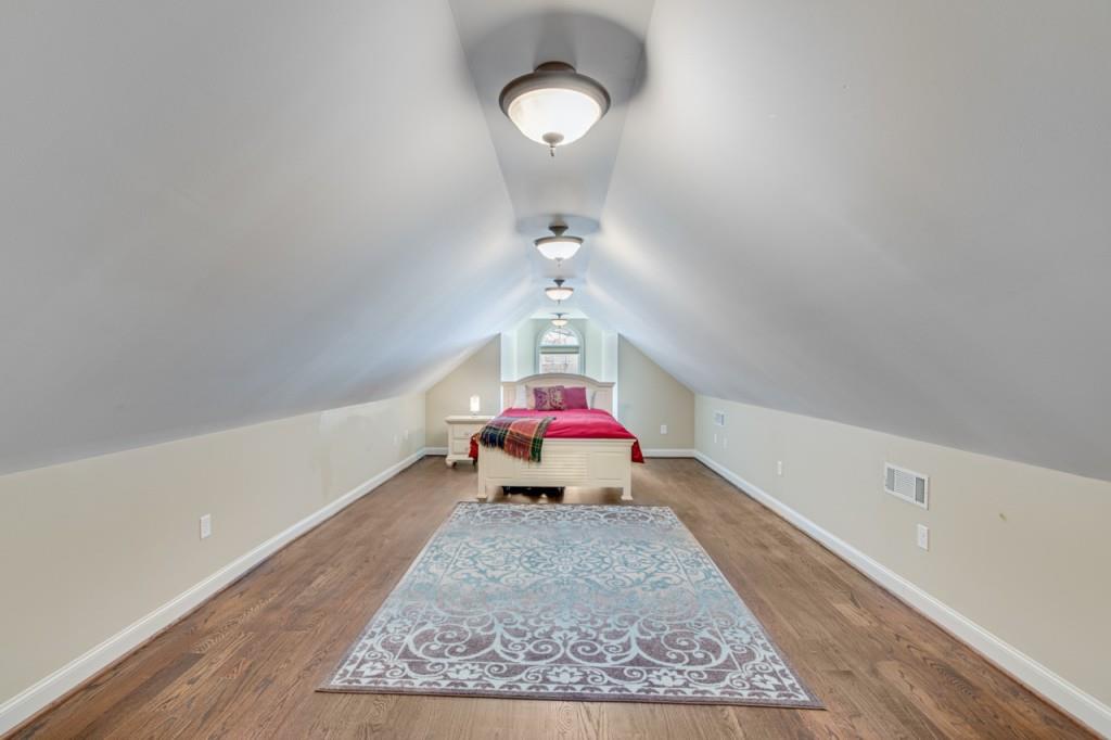2152 Silver Circle Gainesville, GA 30501 - Photo 29 of 46 a view of a hallway with a chandelier