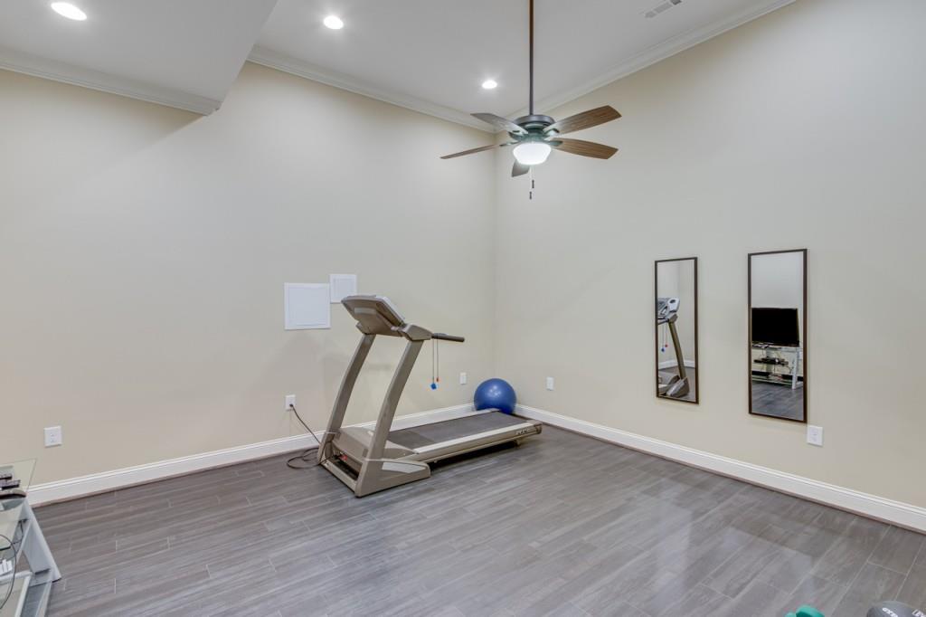 2152 Silver Circle Gainesville, GA 30501 - Photo 41 of 46 a room with gym equipment and wooden floor