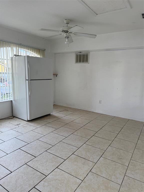 217 Australian Way, Unit 5 Davenport, FL 33897 - Photo 5 of 8 a view of a garage
