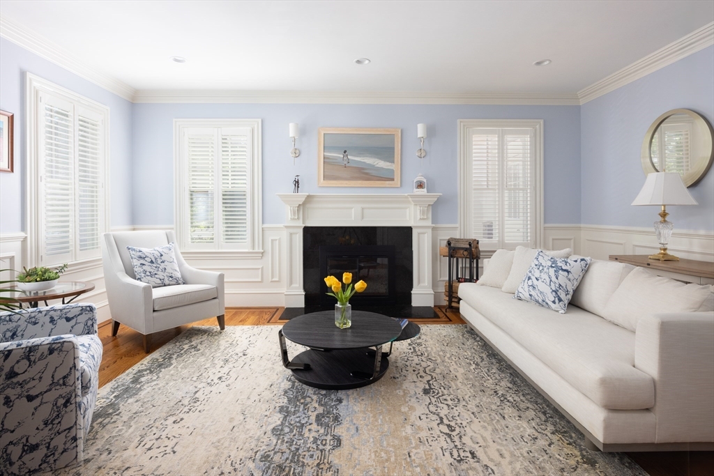 21 Neshobe Road Newton, MA 02468 - Photo 8 of 27 a living room with furniture and a fireplace