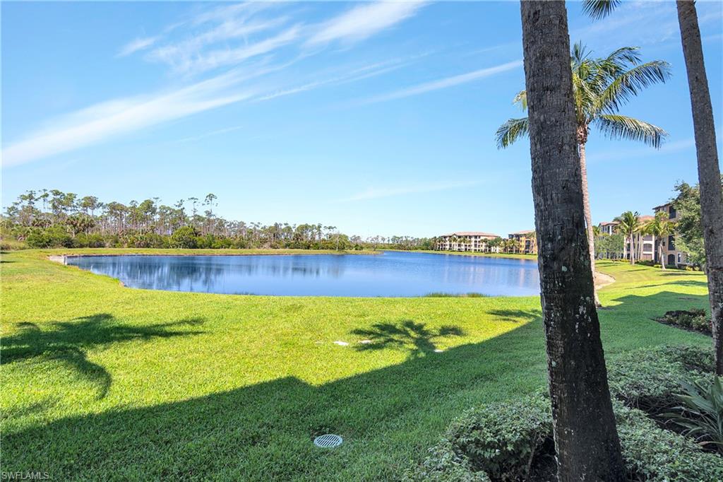 9719 Acqua Court, Unit 214 Naples, FL 34113 - Photo 25 of 50 a view of a city with a lake view