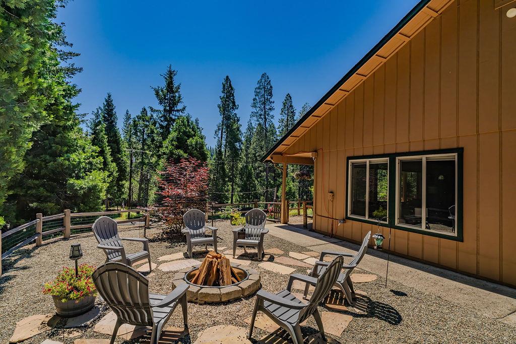 26845 Spring Court Pioneer, CA 95666 - Photo 59 of 89 a view of a patio with couple of chairs and potted plants