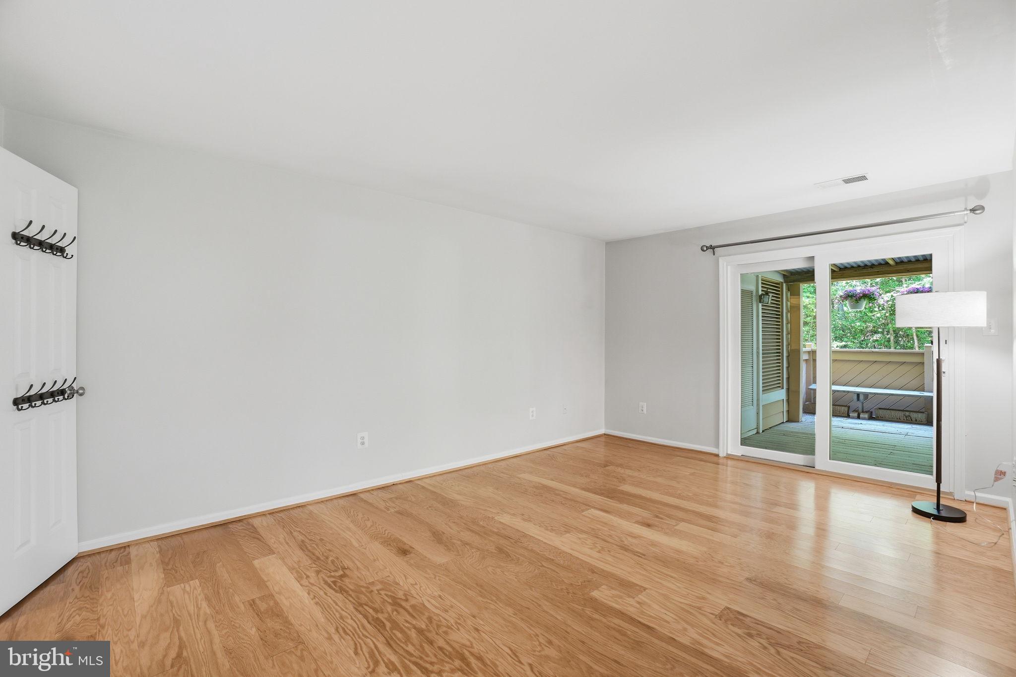 1495 Church Hill Place Reston, VA 20194 - Photo 13 of 27 a view of empty room with wooden floor