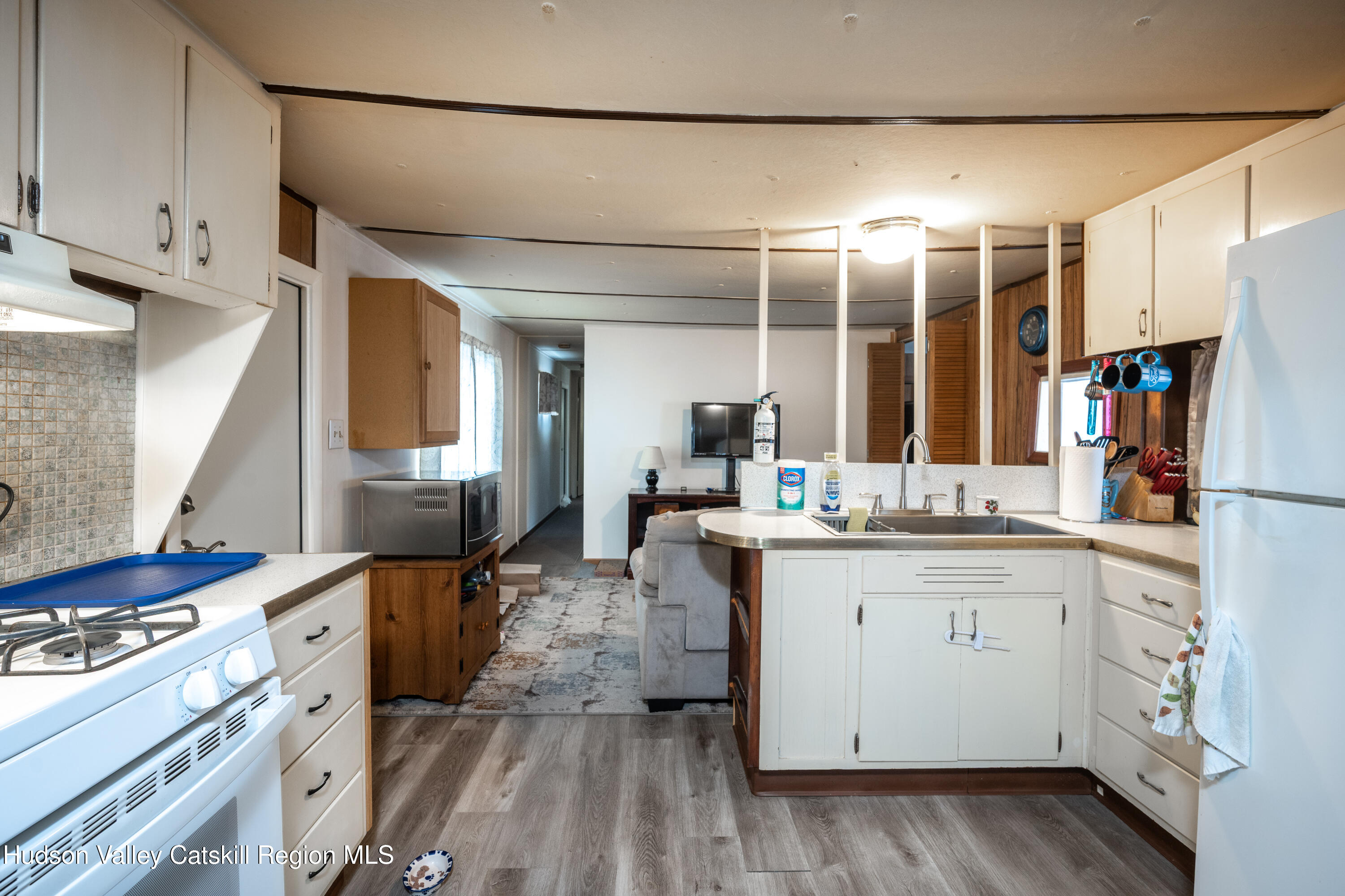 2860 Old Kings Road Catskill, NY 12414 - Photo 12 of 21 a kitchen with sink stove and cabinets
