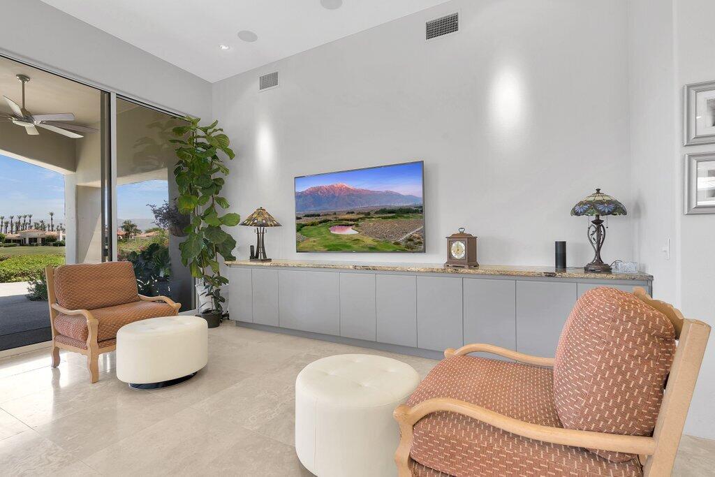 79860 Tangelo La Quinta, CA 92253 - Photo 11 of 45 a living room with furniture flowerpot and a window