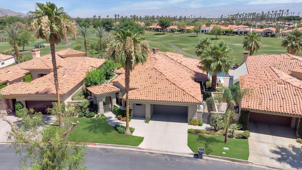 79860 Tangelo La Quinta, CA 92253 - Photo 2 of 45 a aerial view of a house with garden space and lake view